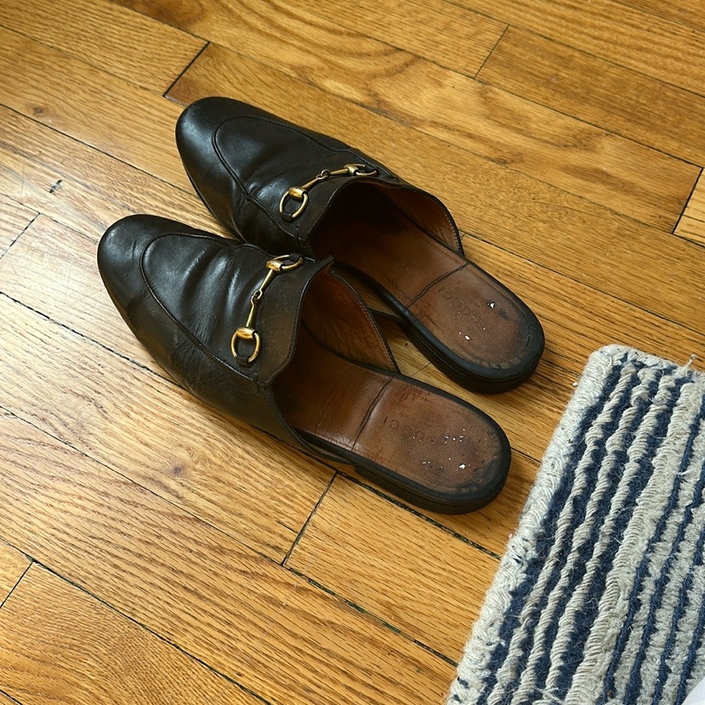 Gucci Black Leather Mules with Gold Detail